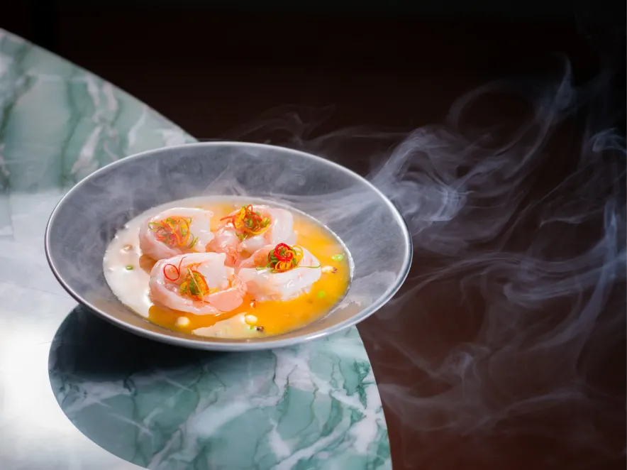 Poached prawns in steaming broth at Chinese restaurant, Dorsett Kai Tak Hotel