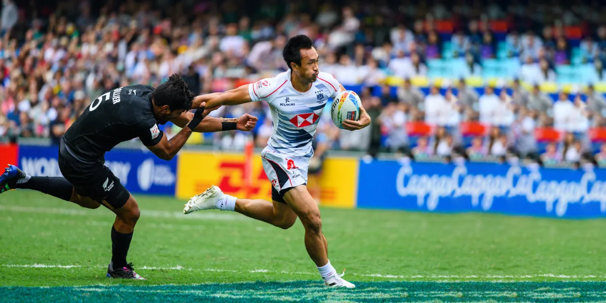 Hong Kong player scoring a try against New Zealand