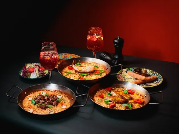 Traditional Spanish paella with mixed paellas, sangria, and tapas at Dorsett Kai Tak