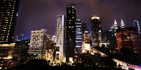 Nightscape image of the Dorsett Kuala Lumpur Hotel facade.