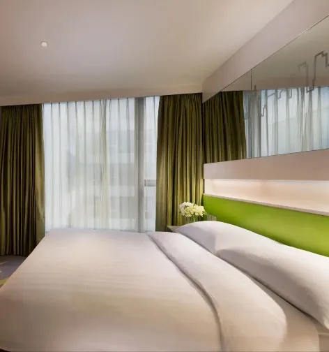 King bed in the Dorsett Tsuen Wan Deluxe Room.