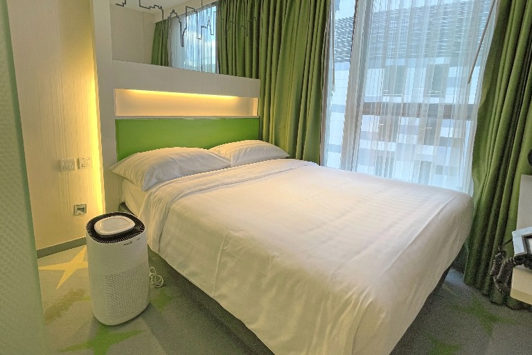 King-size bed in the Dorsett Tsuen Wan Standard Room.