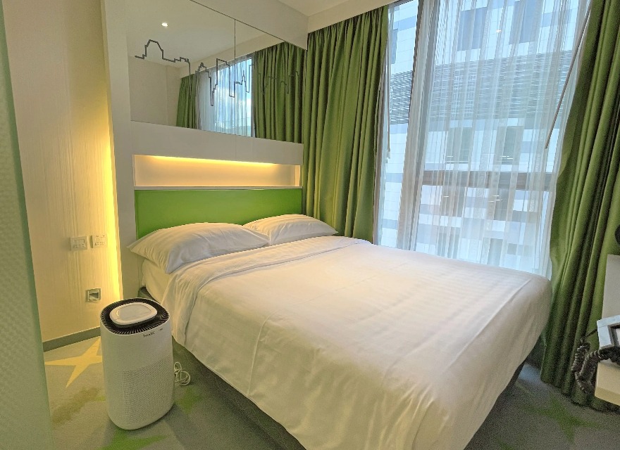 King-size bed in the Dorsett Tsuen Wan Standard Room.